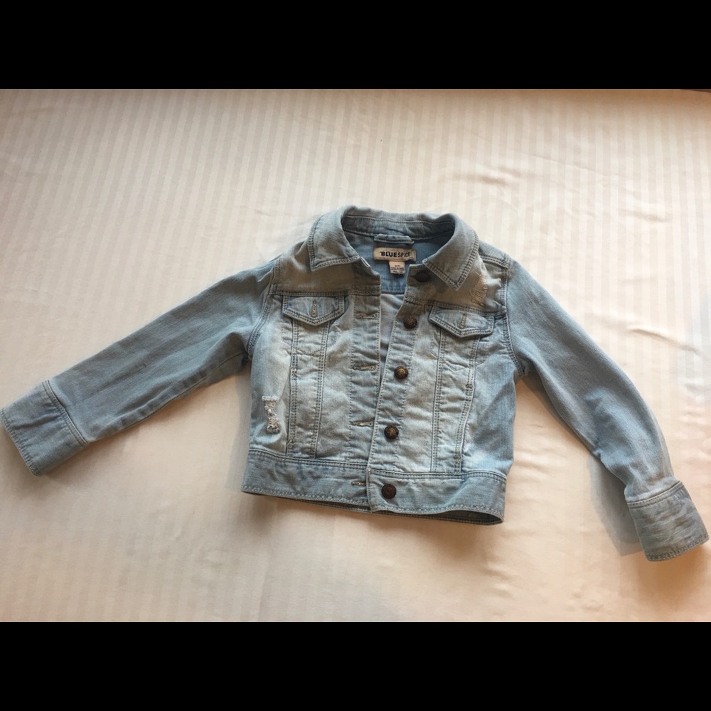 Distressed blue jean jacket